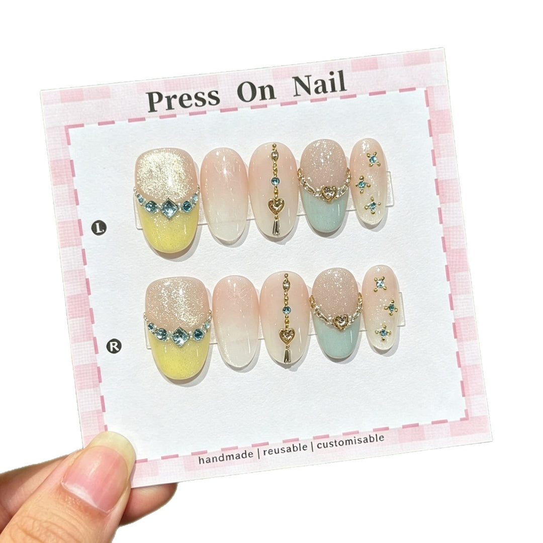 Artistic Press-On Nail Set with Heart and Gem Accents