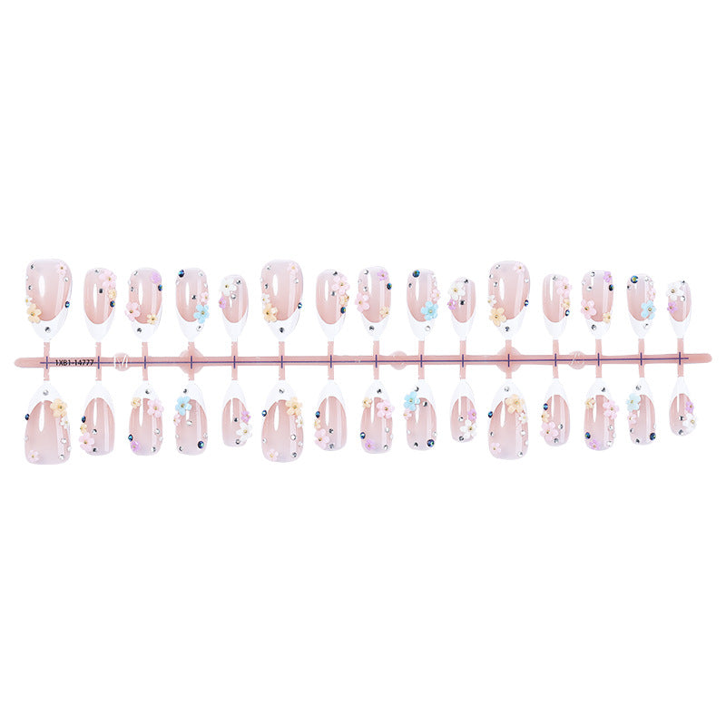 Artificial nail set with delicate floral decorations and sparkling rhinestones Kalsten