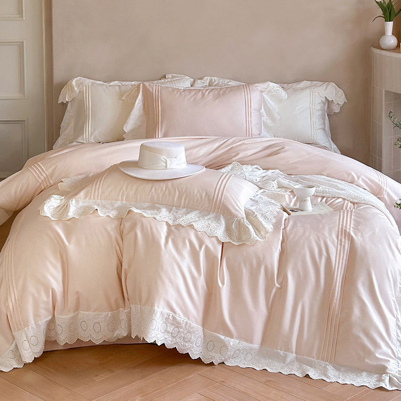 Fine cotton satin bed set with lace, ruffles and decorative stitching