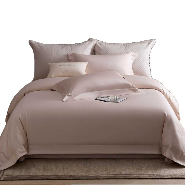 Luxurious cotton satin bedding set with delicate lace trim and hotel finish
