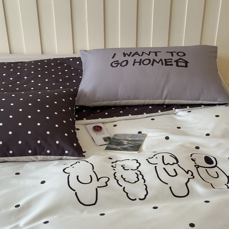 Reversible bedding set made of cotton blend with polka dot pattern and minimalist animal illustration