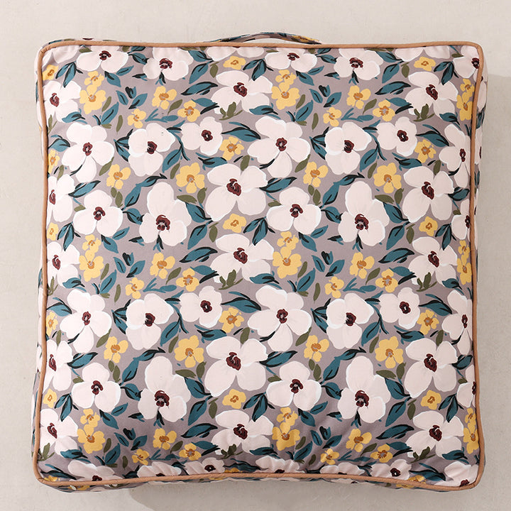 Large decorative seat and floor cushion with floral pattern