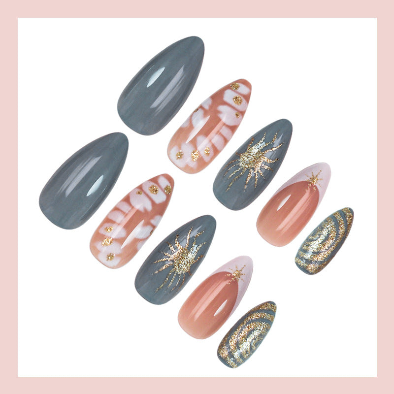 Nail art set with elegant gold accents and creative design Kalsten
