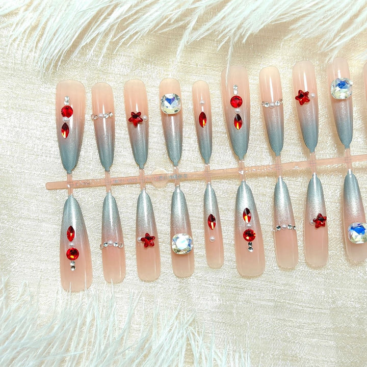 Artificial nails with glamorous glitter design and 3D applications Kalsten