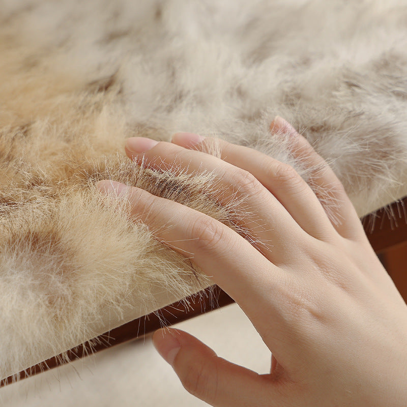 Mini shoulder bag with faux fur cover and narrow straps