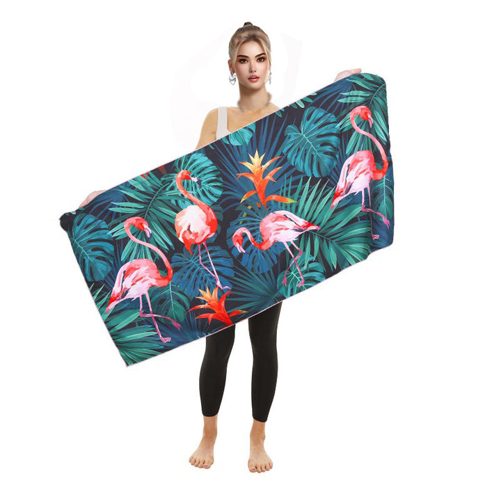 Beach towel with vibrant flamingo motifs and quick-drying material Kalsten