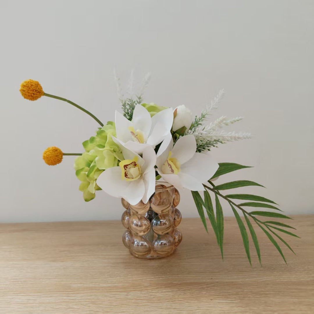 Lifelike Floral Arrangement with Orchids and Greenery