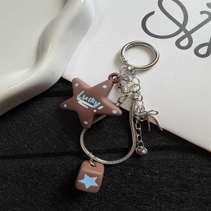 Playful Star-Themed Key Charm Kalsten