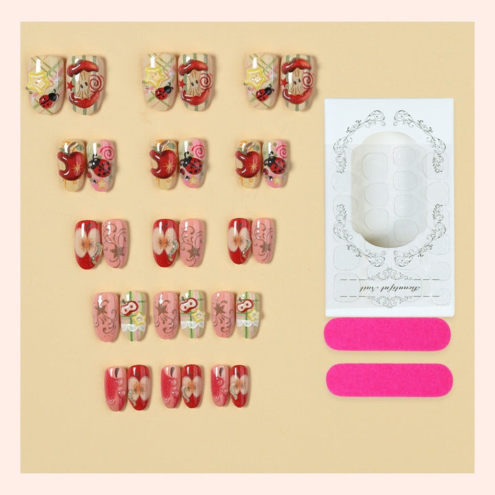 Creative nail art set with playful designs and glitter accents Kalsten