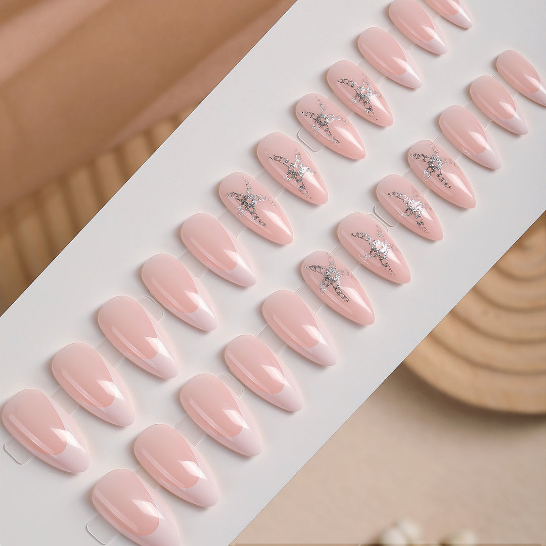 Artificial nail set with delicate pearlescent and glitter accents Kalsten