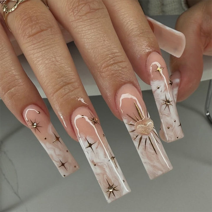 Nail set with glamorous gold decorations Kalsten