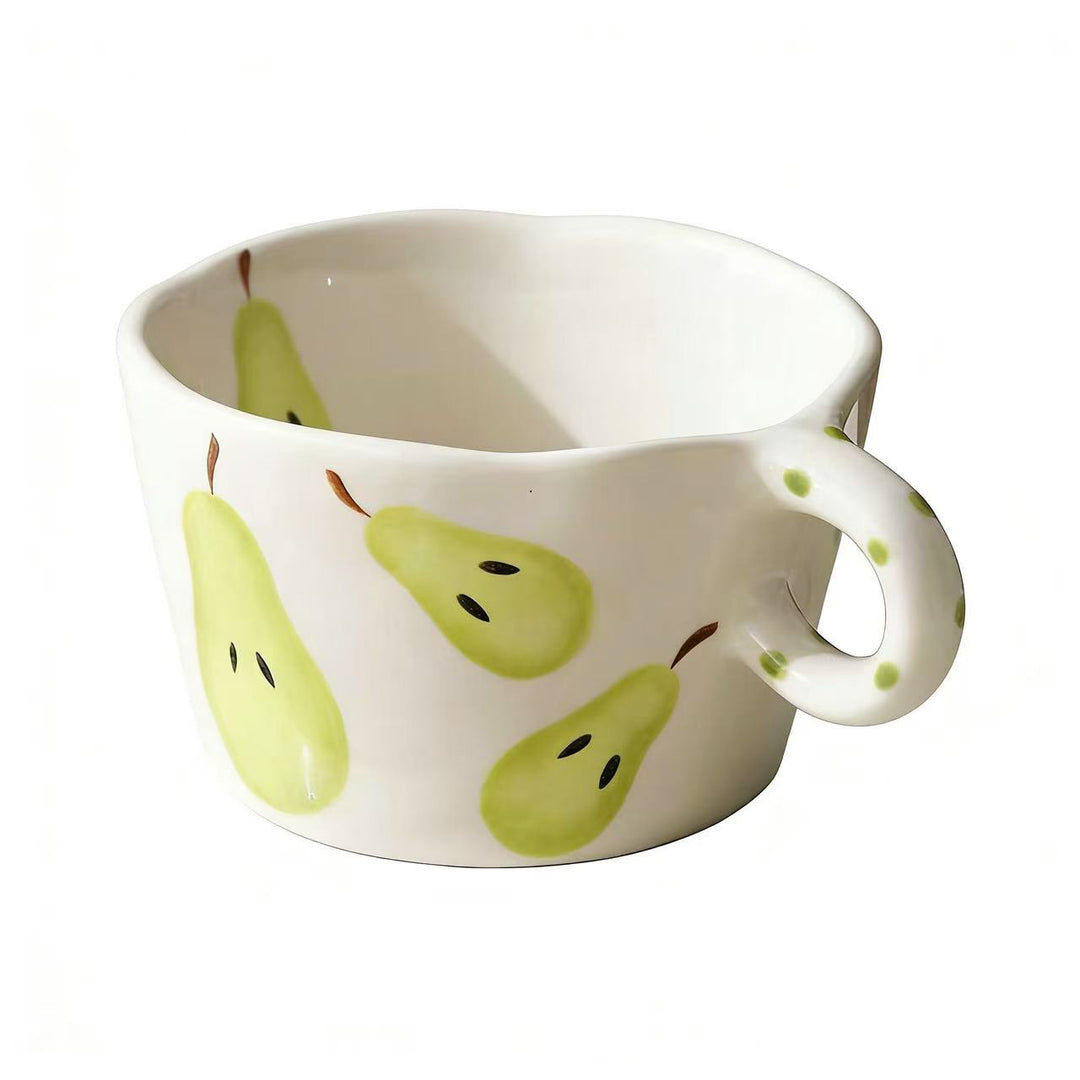 Ceramic mug with hand-painted banana illustration and round handle