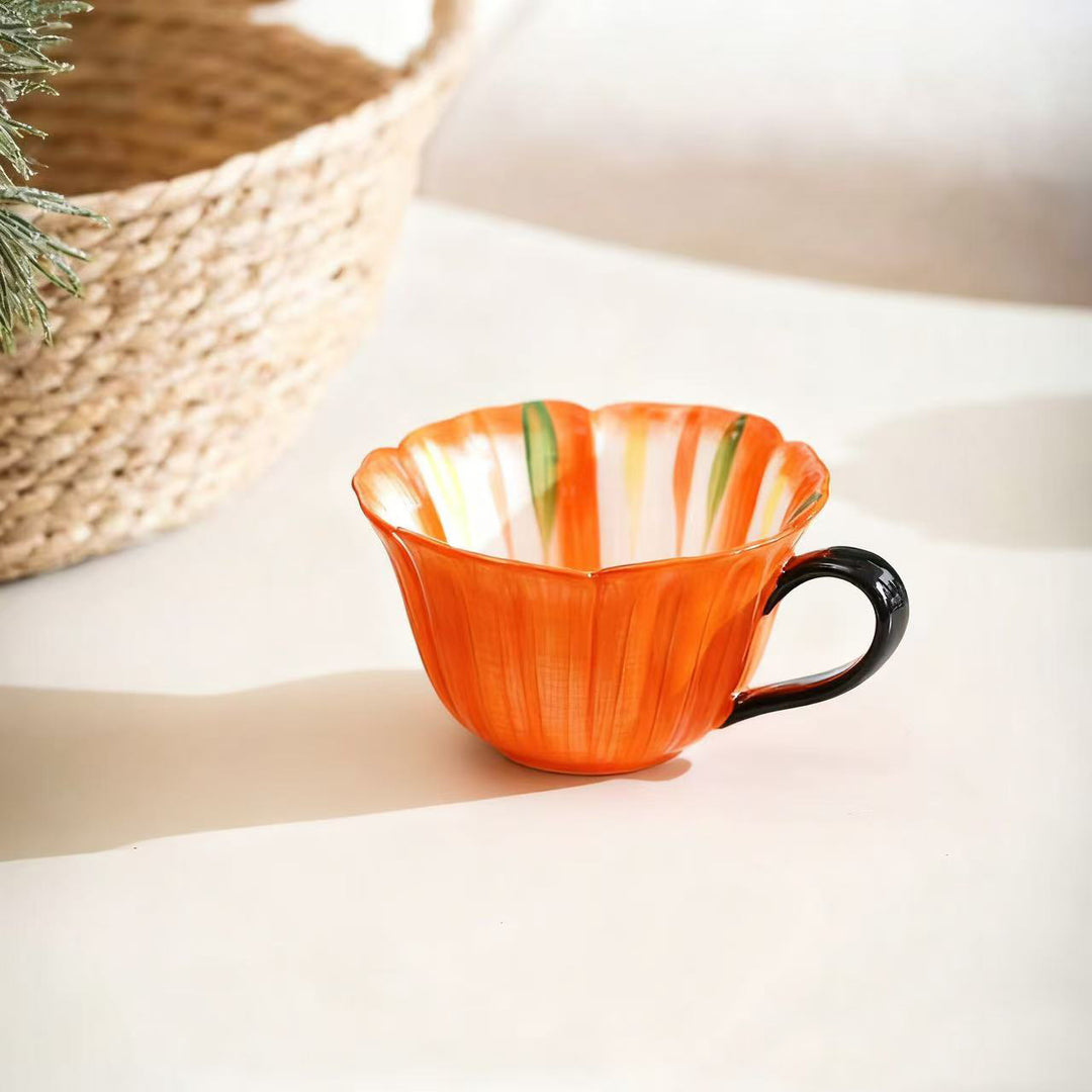 Handcrafted ceramic mug with shell-shaped wave edge and contrasting handle