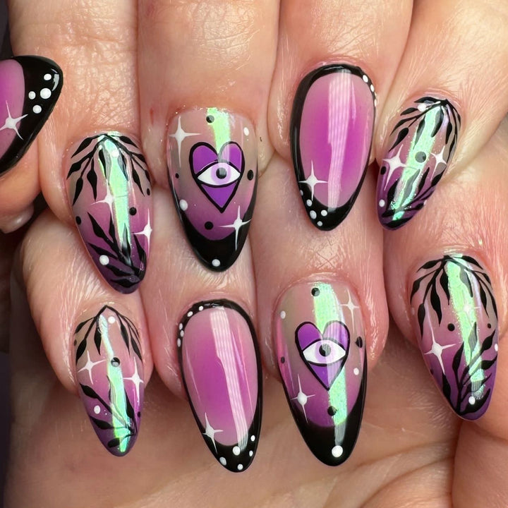 Artful nail art with floral design and glamorous accents Kalsten