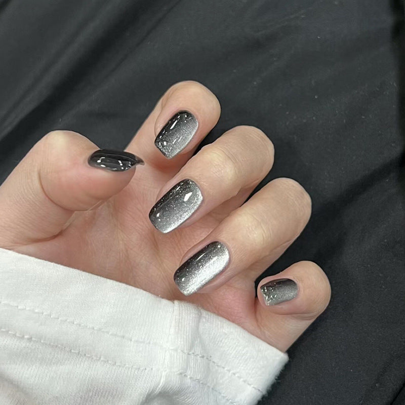 Artifical nail set with glamorous ombre effect and glitter embellishments Kalsten