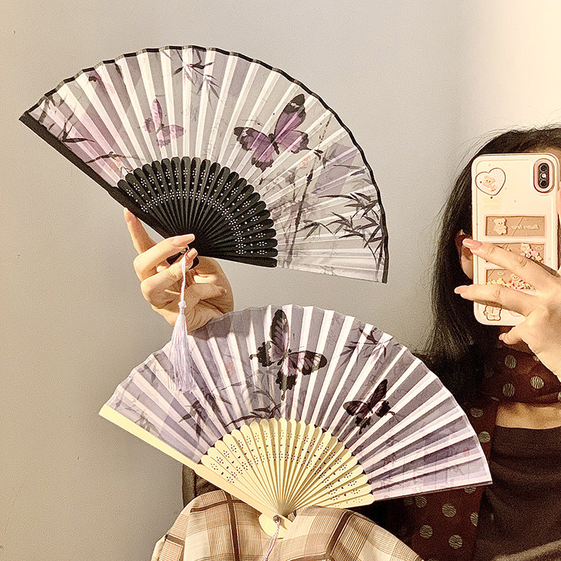 Elegant fan with elaborate butterfly motif Kalsten