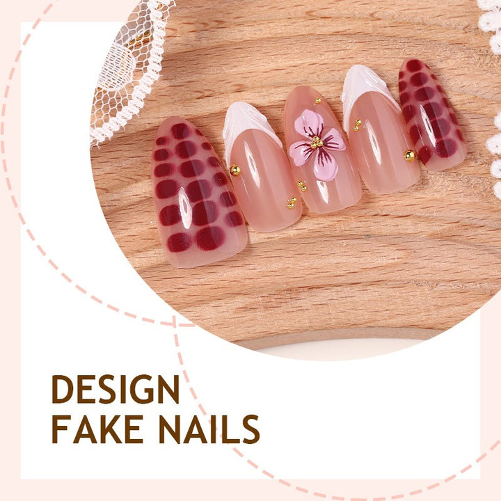 Artificial nail set with exciting flower and glitter designs Kalsten