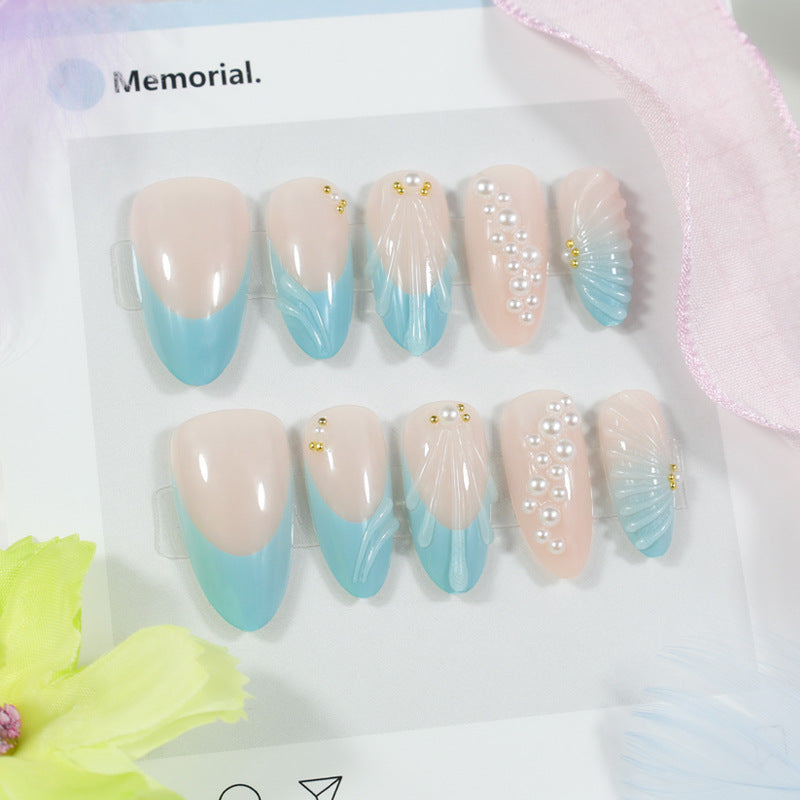 Art nail set with elegant shell and pearl decorations Kalsten