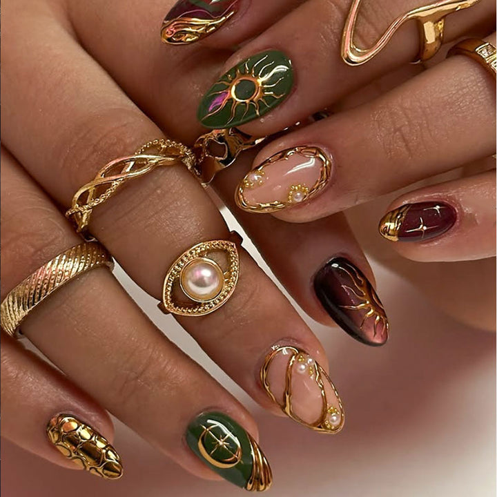 Artistic Gold-Embellished Nail Art