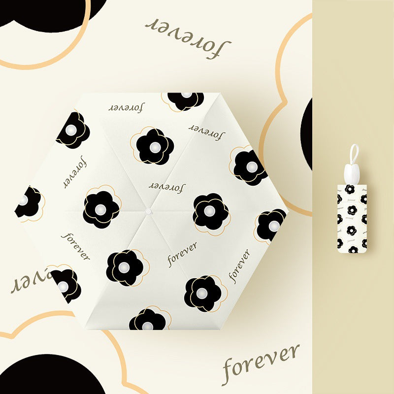 Ladies folding umbrella with playful flower design Kalsten