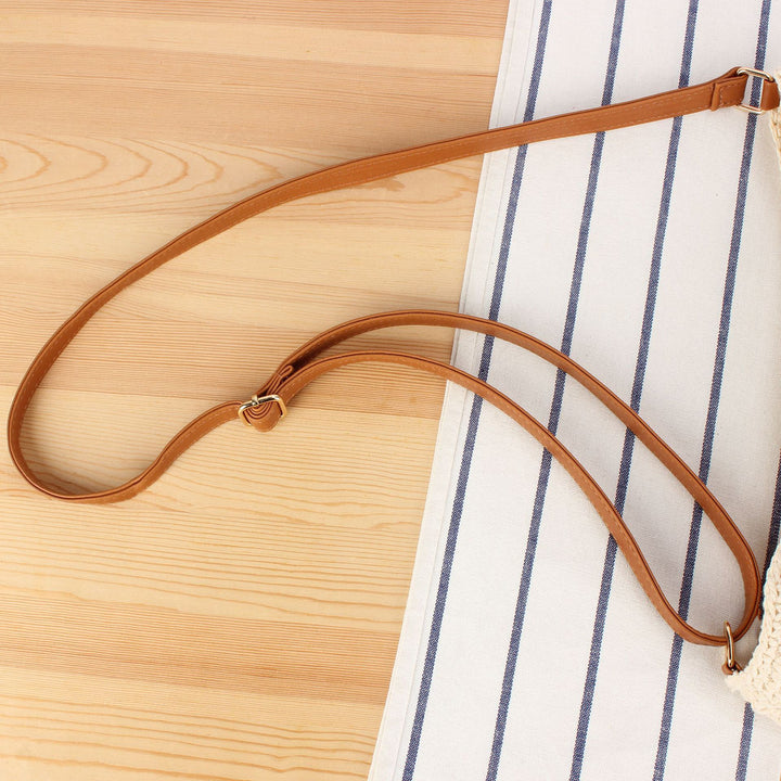 Handbag made of hand-knotted natural material with leather accents Kalsten