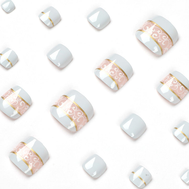 Artful toenail art with elegant golden accents Kalsten