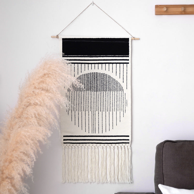 Handcrafted cotton tapestry wall decoration with macrame fringes and geometric circle motif