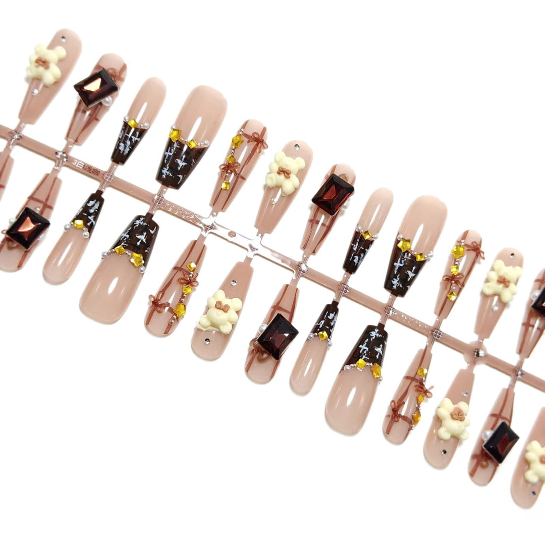 Artificial nails with playful animal designs and glitter effects Kalsten