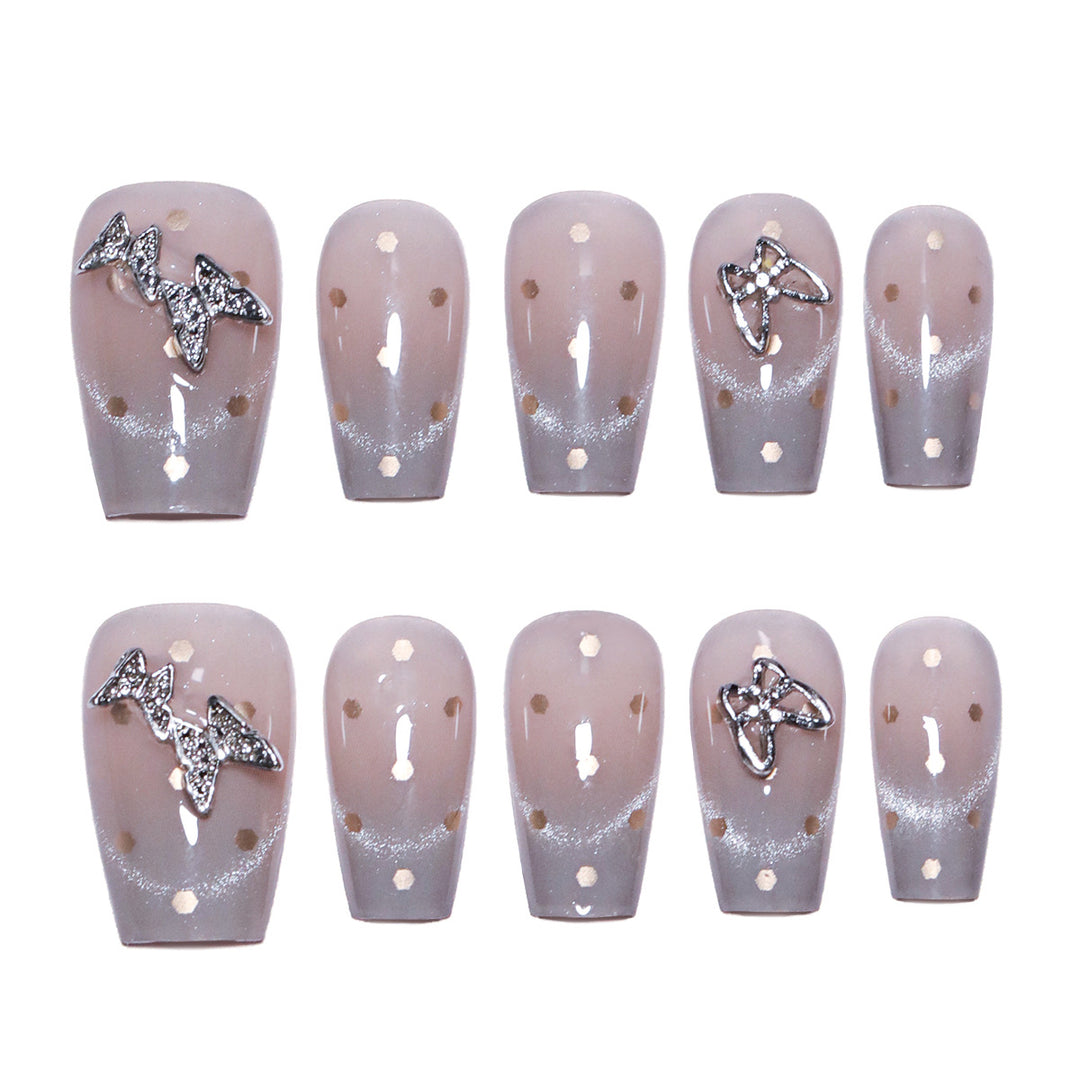 Artificial nail art with glitter details and bow accents Kalsten
