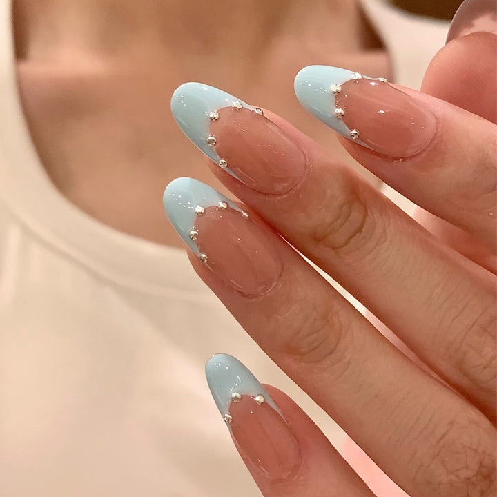 Artistic French Tip Nail Design with Glitter Accents Kalsten