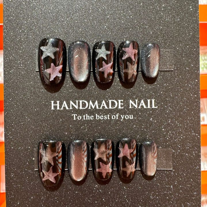 Artistic Press-On Nail Art Set Featuring Handmade Star Designs