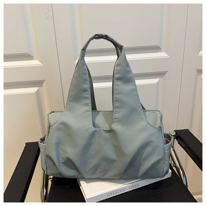 Fashionable Multi-Pocket Handbag