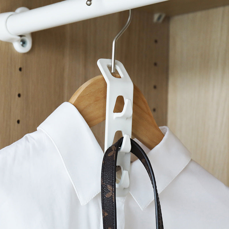 Clothes hanger connector clips made of sturdy plastic for space-saving storage