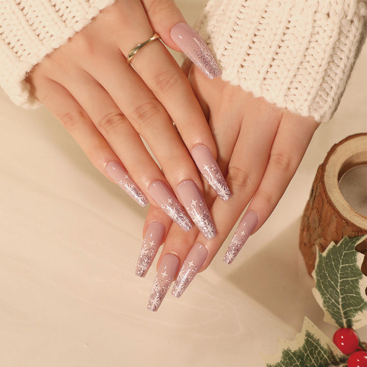 Artful nail art in winter design with glitter and snowflakes Kalsten