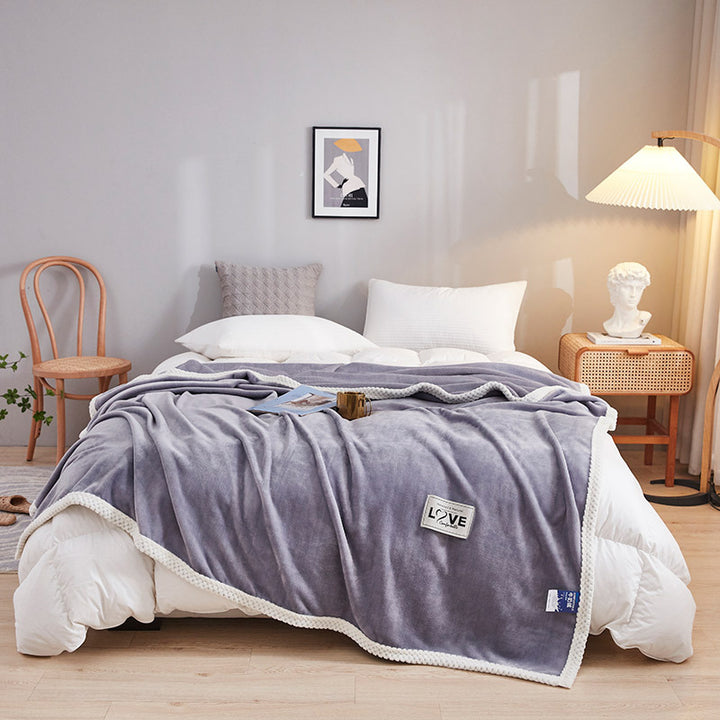 Women's cozy fleece blanket with playful cloud pattern Kalsten
