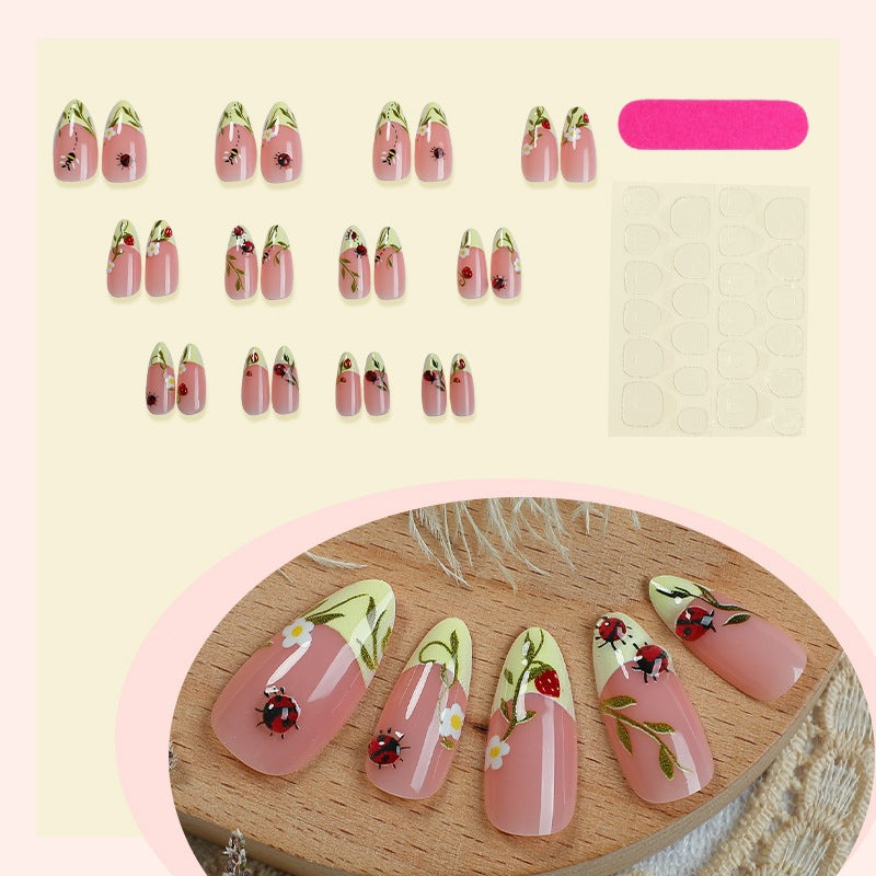 Nail set with floral motifs and glossy accents Kalsten
