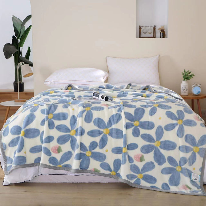 Women's cozy fleece blanket with playful cloud pattern Kalsten