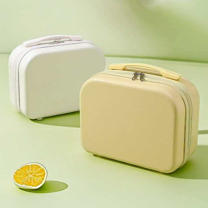 hard-shell travel vanity case with molded handle and double-zip closure Kalsten
