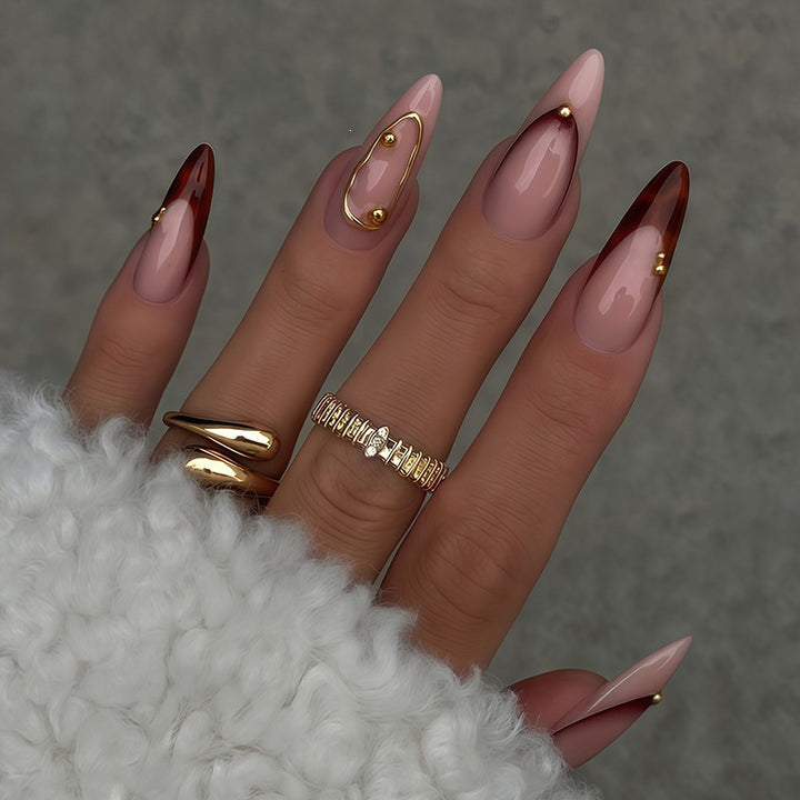 Acrylic nail set with elegant ombre design and golden accents Kalsten