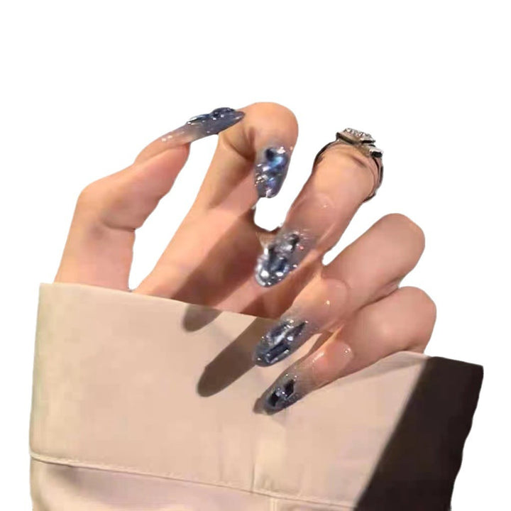 Artificial nails in creative moon and star design Kalsten