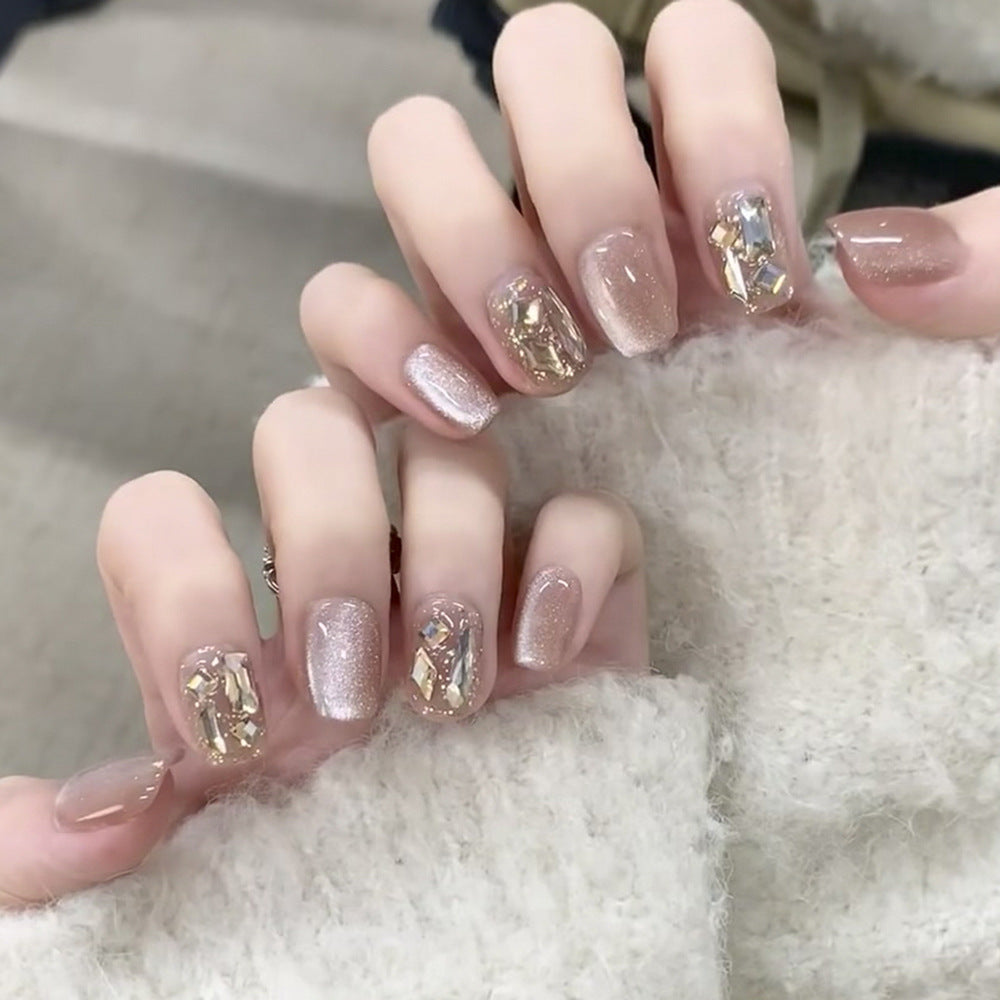 Elegant Nail Art with Shiny Accents Kalsten