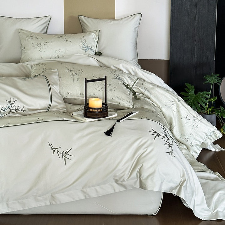 Reversible cotton satin bedding set with fine bamboo print and pillowcases with tie bands