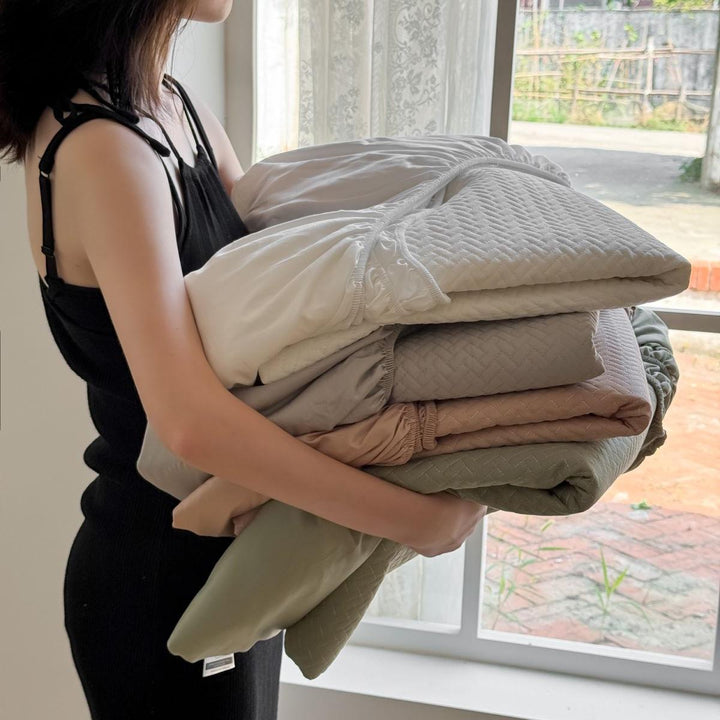 Comfort mattress topper with textured waffle surface and deep edge