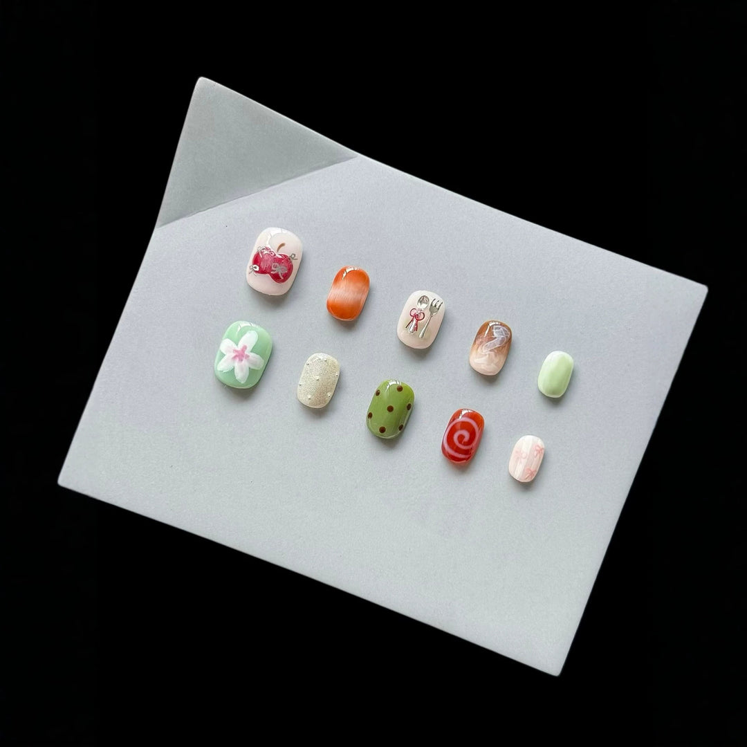 Artistic Press-On Nail Set with Unique Sketch Designs