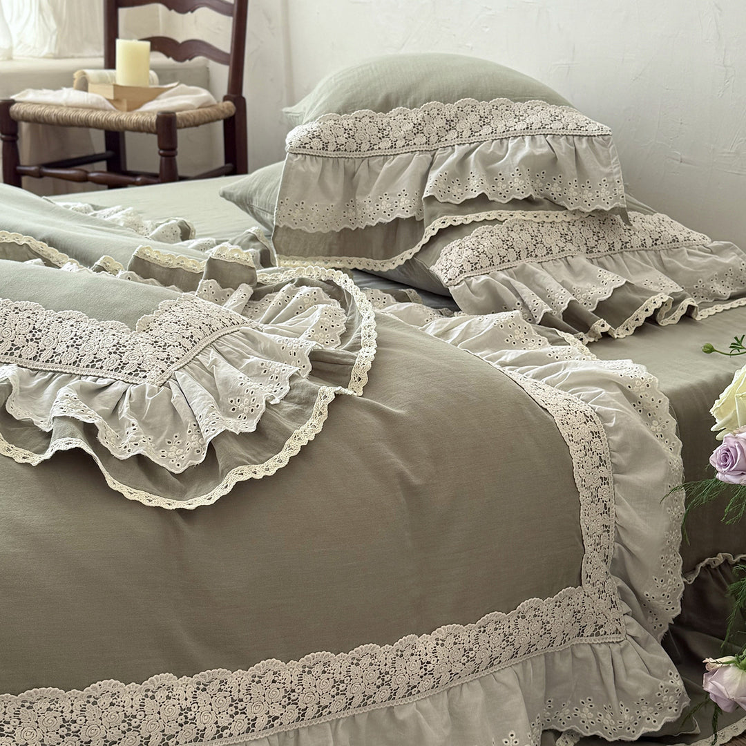 Romantic bedding set in country house style with ruffles and lace trim