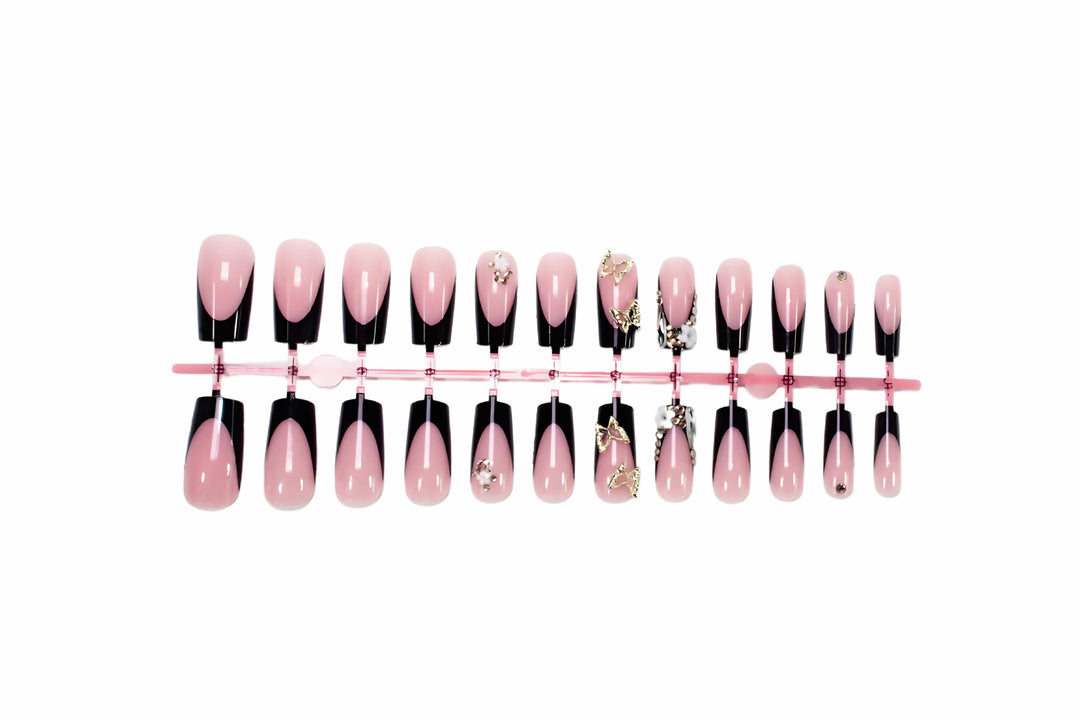 Creative nail art set with romantic floral designs and glamorous accents Kalsten