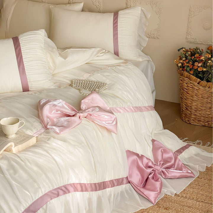 Bedding set with large satin bows, ruffled frill and decorative pillowcases
