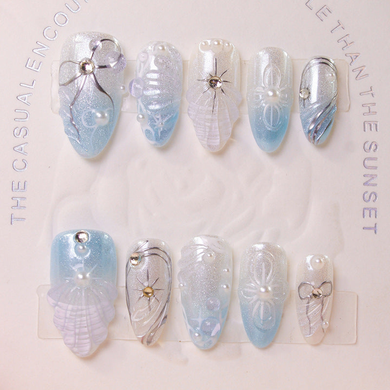 Artificial nail set with elegant shell and pearl accents Kalsten