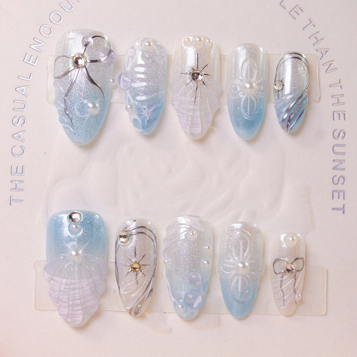 Artificial nail set with elegant shell and pearl accents Kalsten