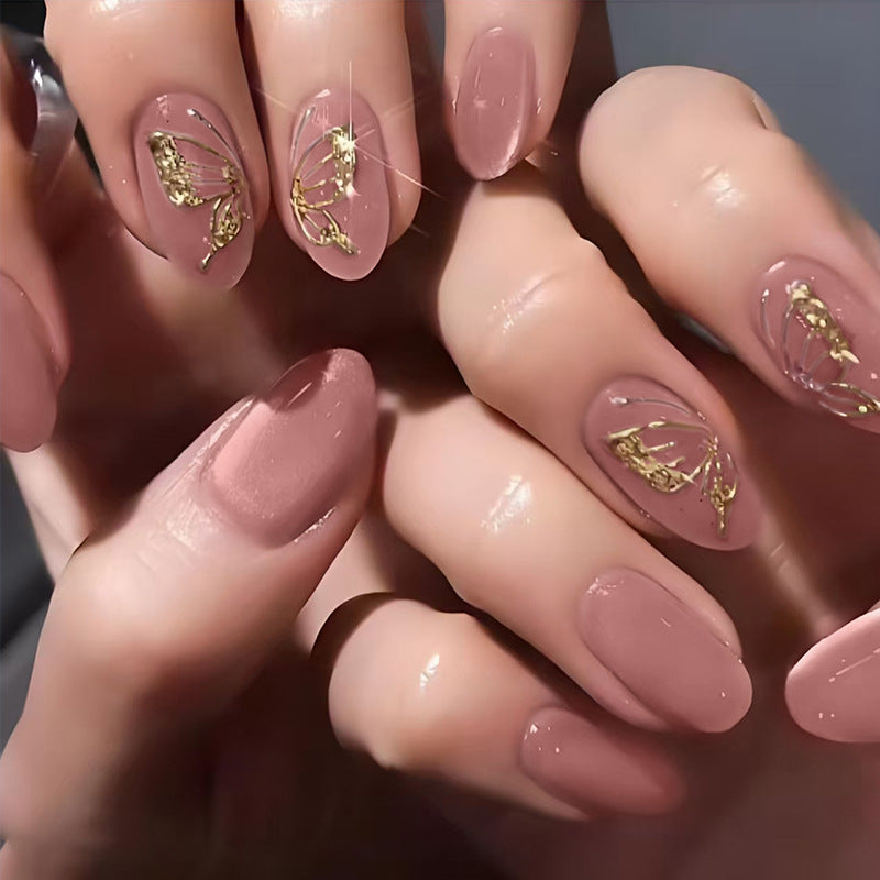 Acrylic nail set with elegant golden accents and shimmering finish Kalsten
